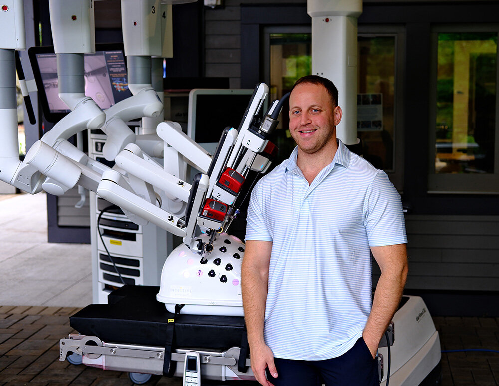 Justin Floch, of Intuitive Surgical, showed people the DaVinci Surgical Robot that is able to perform a wide variety of less invasive surgeries on the lower half of the human body. Each machine costs about $2 million.